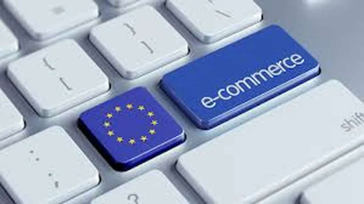 A computer keyboard with an EU-flag key next to a blue "e-commerce" key, illustrating online retail across the European Union